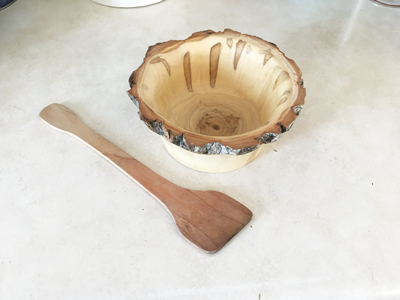 A wood bowl and paddle made by Ray Dueck